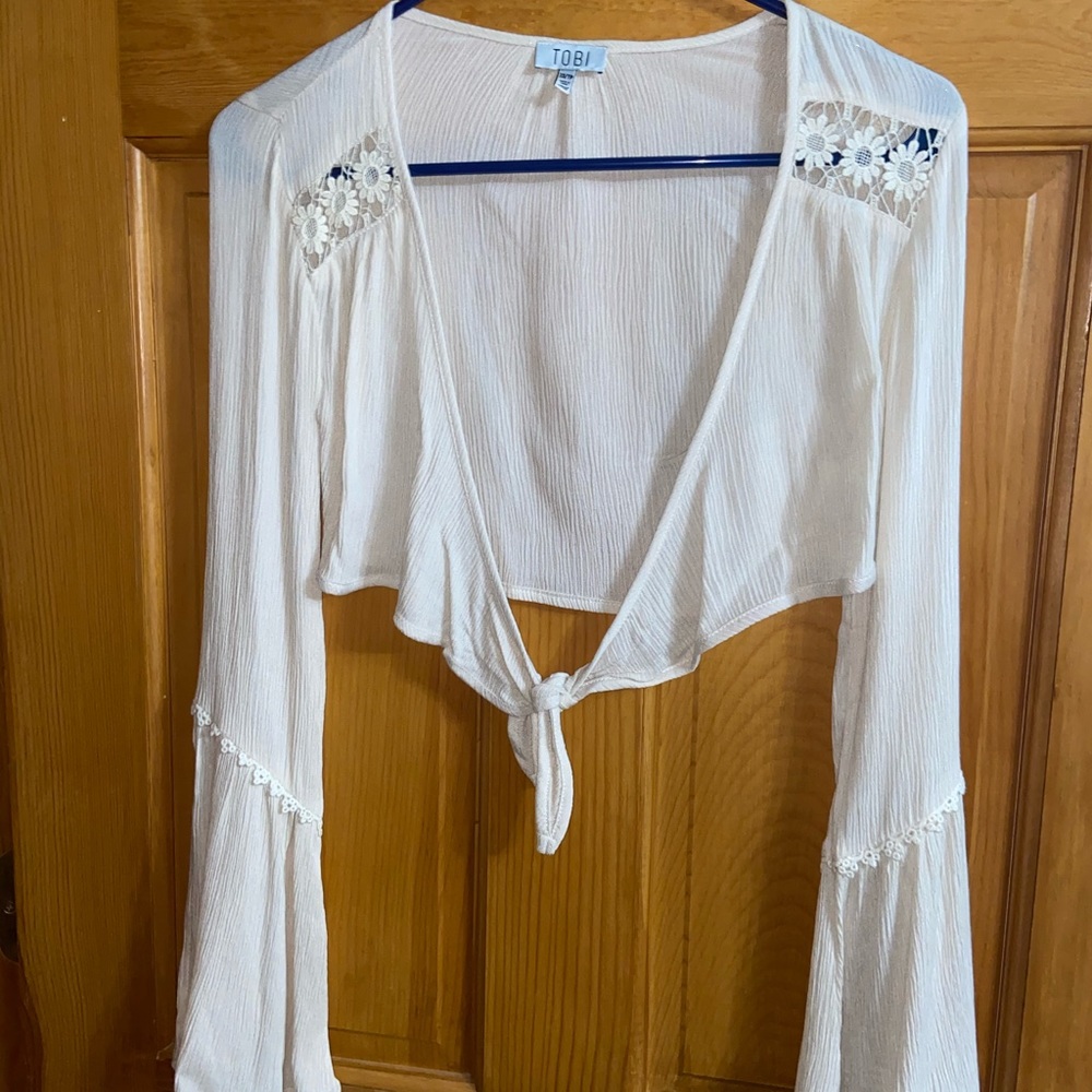 Cream colored tie crop top. Bell Sleeve Shirt